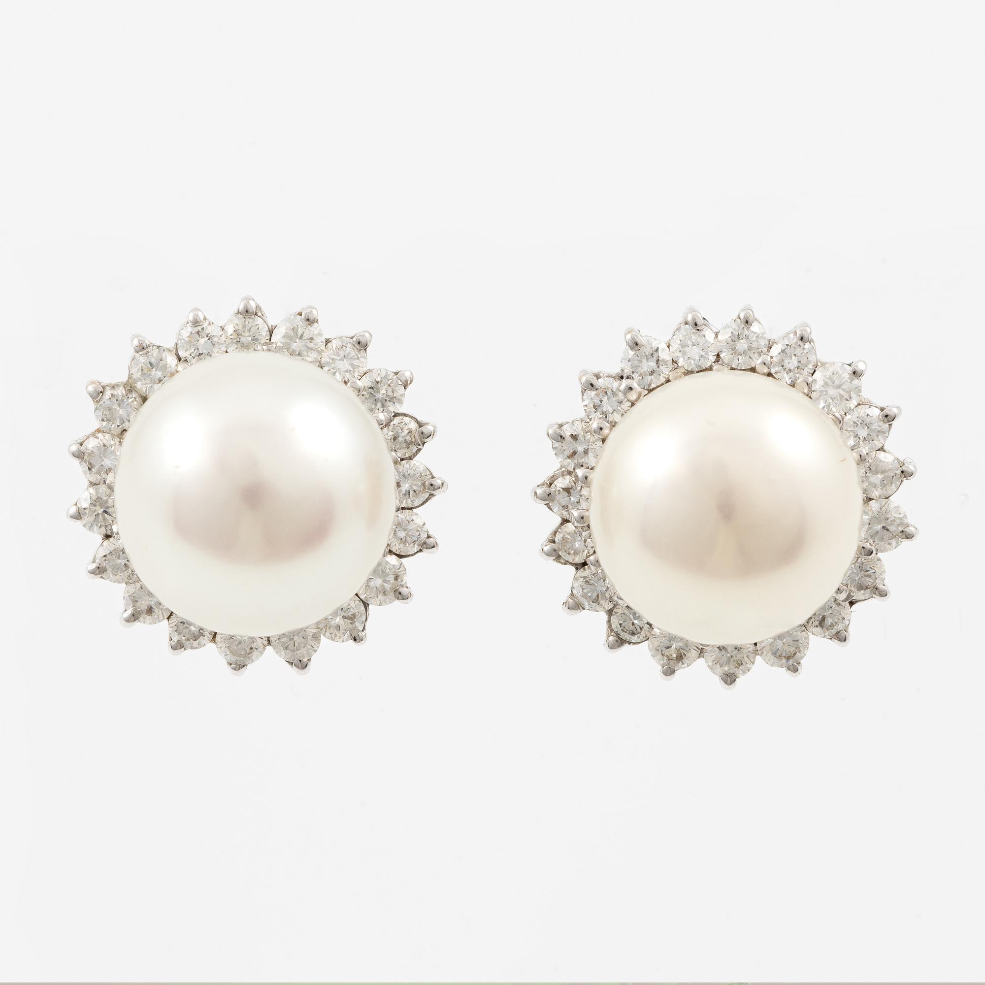 Earrings, a pair, 18K white gold with cultured pearls and brilliant-cut diamonds.