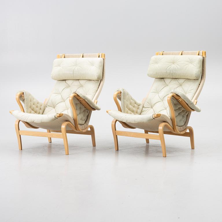Bruno Mathsson, a pair of 'Pernilla' armchairs, Dux, Sweden, later part of the 20th century.