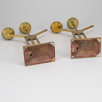 A pair of Art nouveau brass candelabra, early 20th Century.