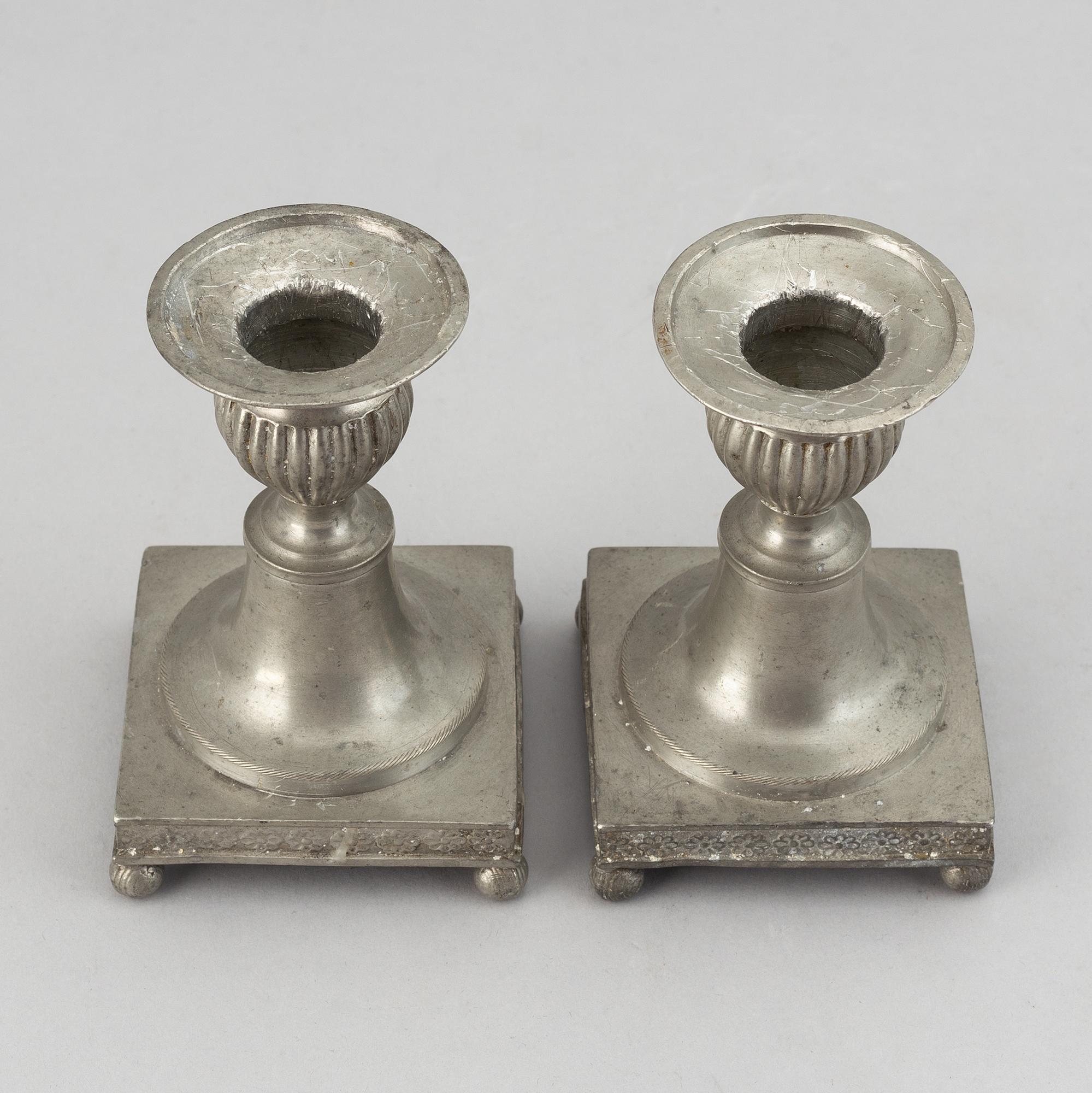 A pair of pewter candlesticks by Niclas Anström, Växjö 1835.