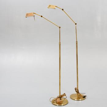 A pair of brass floor lamps 21st century.