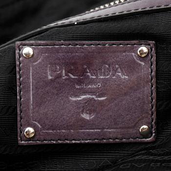 PRADA, a patent white and blue bag.