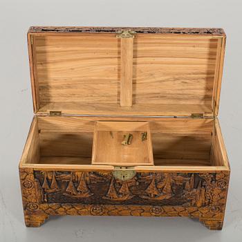 A late 20th Century Oriental Carved Camphor Wood Chest.