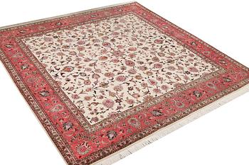An old Tabriz carpet, part silk, 60 raj, c. 253 x 250 cm.