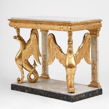 A Swedish Empire gilt wood and white marbel console table.