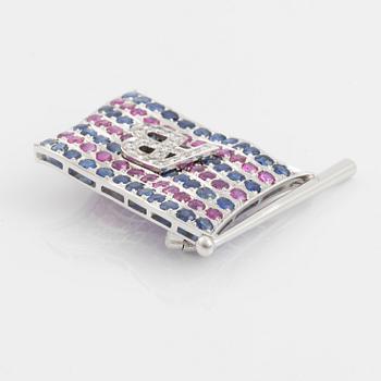 A brooch with Broströms flag in 18K white gold with monogram.