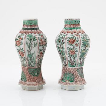 A matched pair of famille verte vases, Qing dynasty, 18th Century.