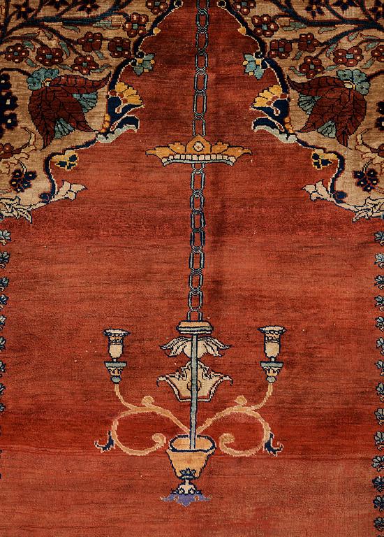 A rug, an antique silk Heriz, ca 166,5-170 cm x 116-120 cm.