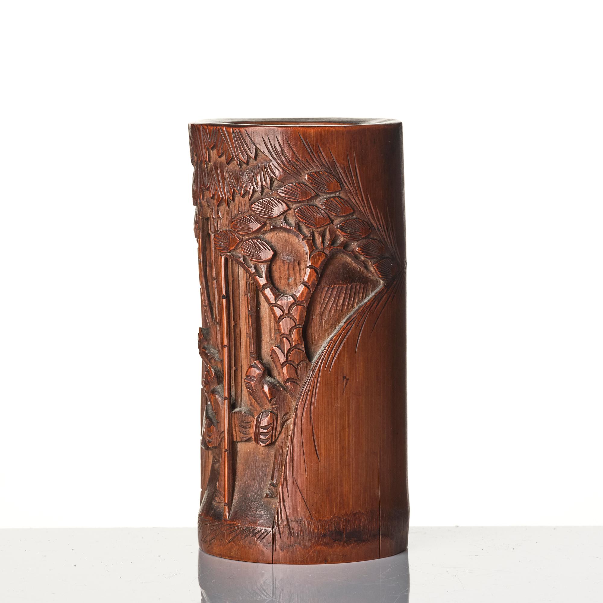 A Chinese brushpot, Qing dynasty, circa 1900. An archaistic bronze ewer and a silvered South East Asian bowl with stand.