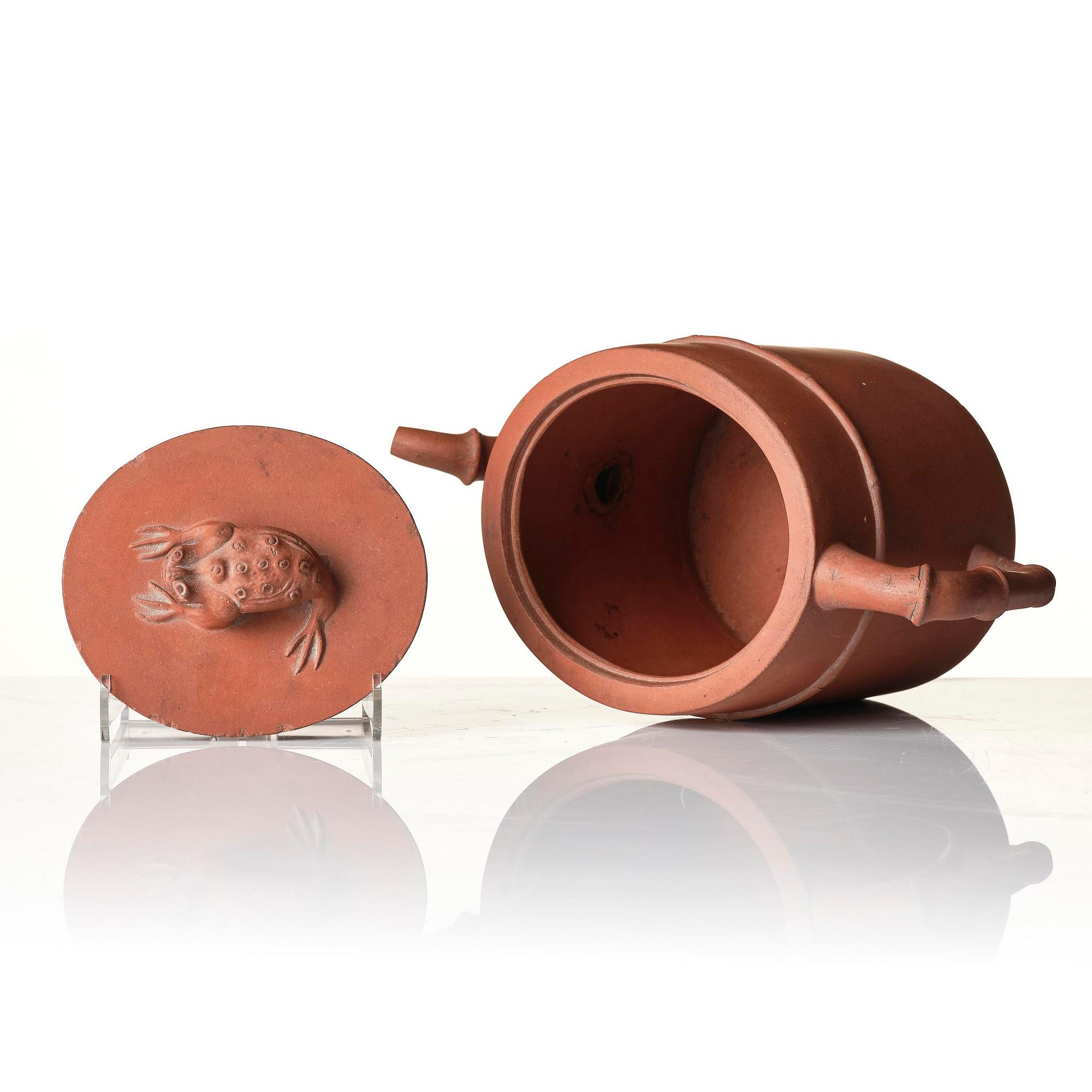 An yixing 'toad' tea pot with cover, Qing dynasty, 18th century.