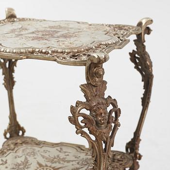 A three-tiered metal pedestal, first half of the 20th century.