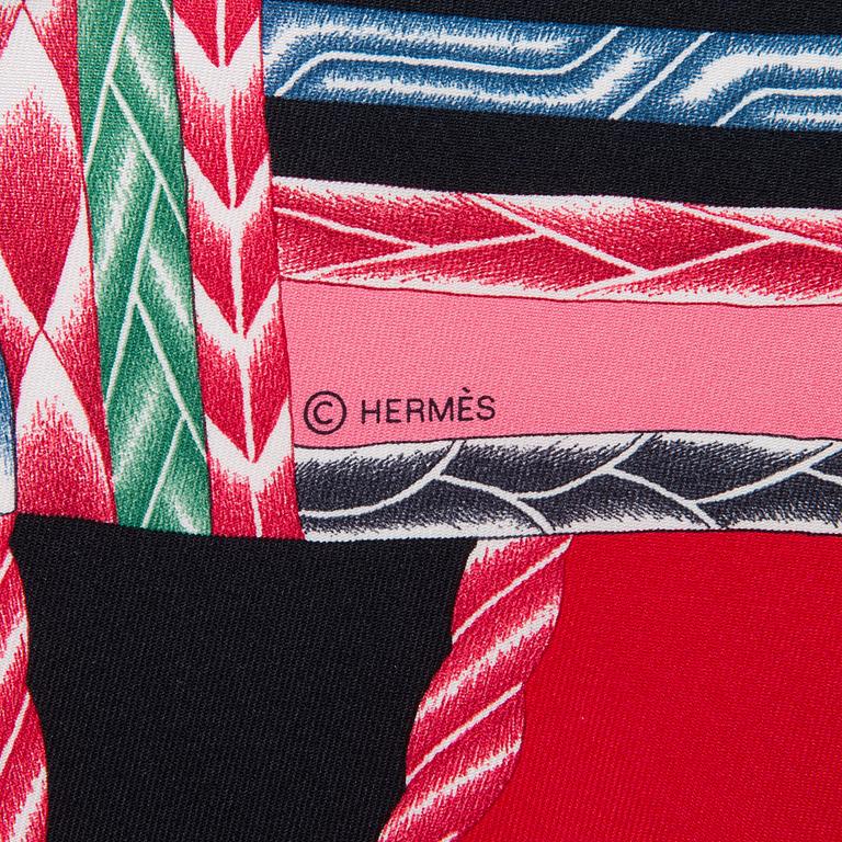 Hermès, 'Robe du soir' scarf and a Hermès scarf ring.