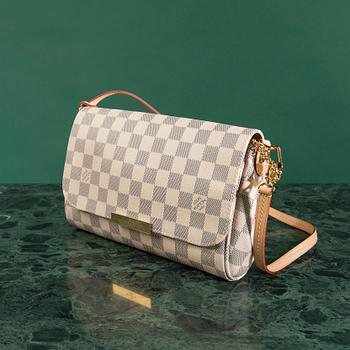 A bag by Louis Vuitton.