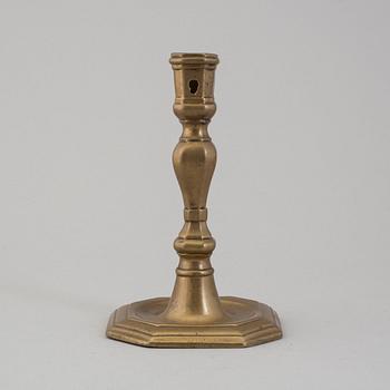 An 18th century bronze candlestick.