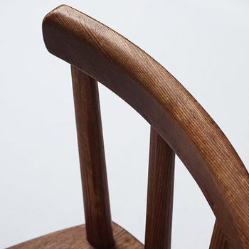 Axel Einar Hjorth, a pair of stained pine 'Utö' chairs, Nordiska Kompaniet, Sweden 1930s.