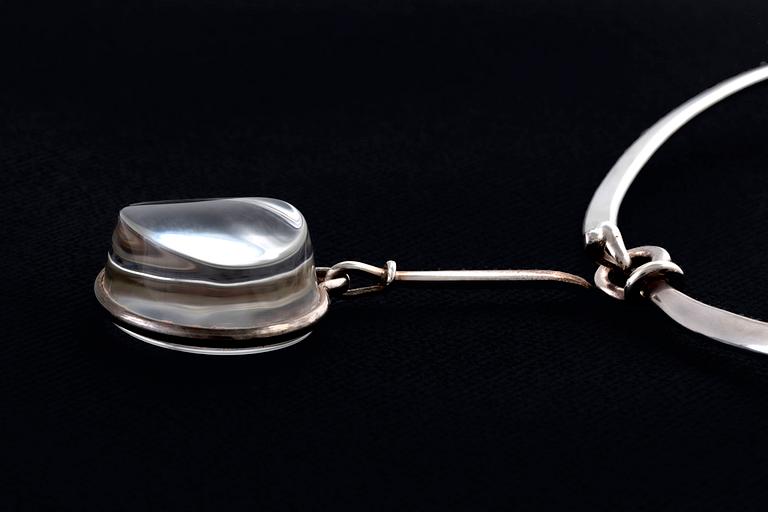 Vivianna Torun Bülow-Hübe. Necklace with pendant, sterling silver and rock crystal or glass.