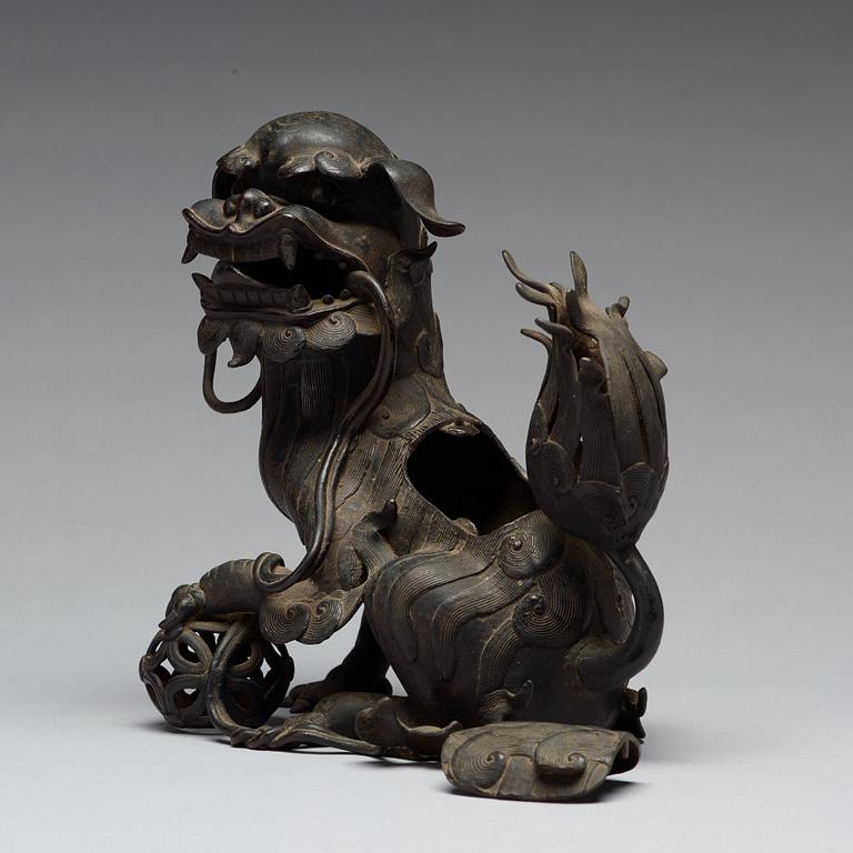 A bronze censer with cover in the shape of a Buddhist lion, Qing dynasty, 19th Century.