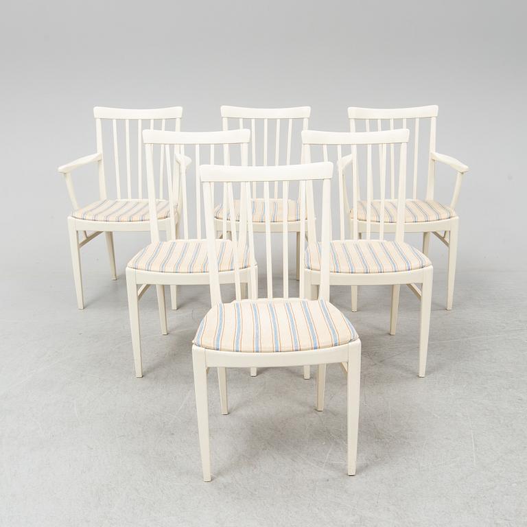 A second half of the 20th Century 'Herrgården' dining table with four chairs and two armchairs by Carl Malmsten.