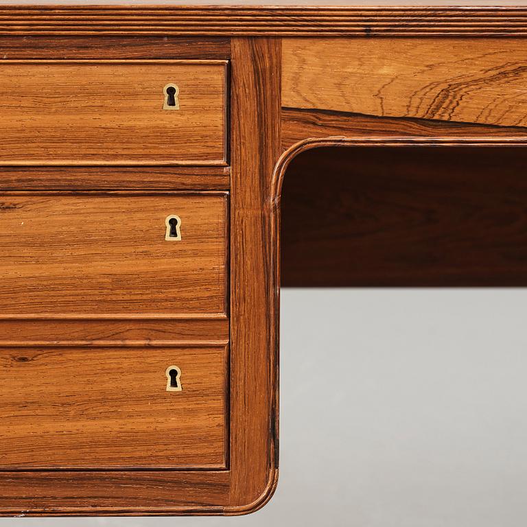 Ole Wanscher, a palisander desk by cabinetmaker A.J. Iversen, Denmark 1940's-50's.