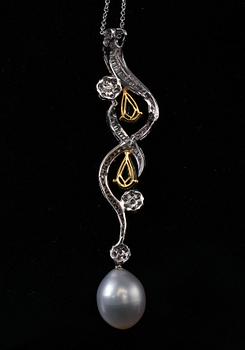 HÄNGE, Briljant- och baguetteslipade diamanter ca 2.98 ct. Kolumbianska smaragder ca 1.72 ct. Söderhavspärla  13 mm.