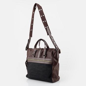 Hugo Boss. a brown leather bag.