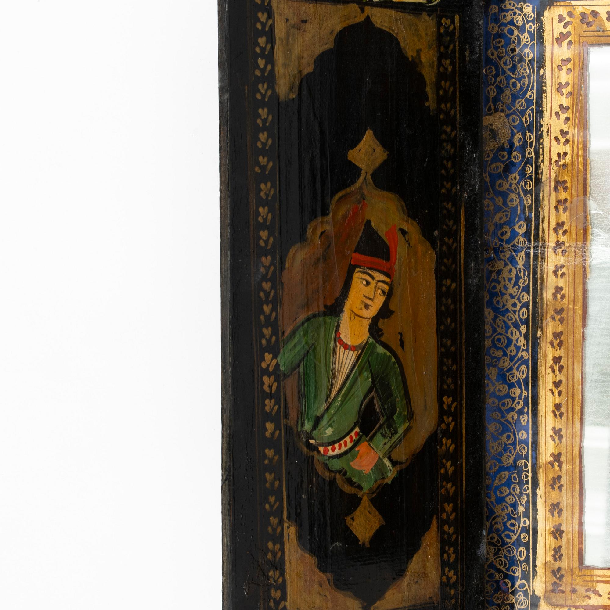 A Qajar Khatamkari laque mirror, circa 1900.