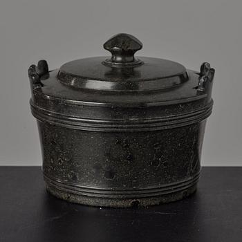 A serpentine stone butter box and cover circa 1800.
