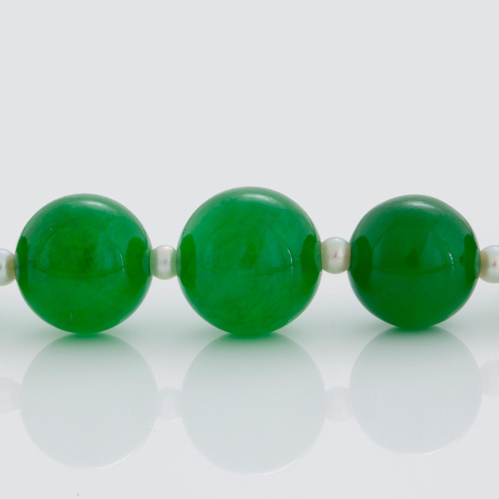 A NECKLACE with jadeite beads.