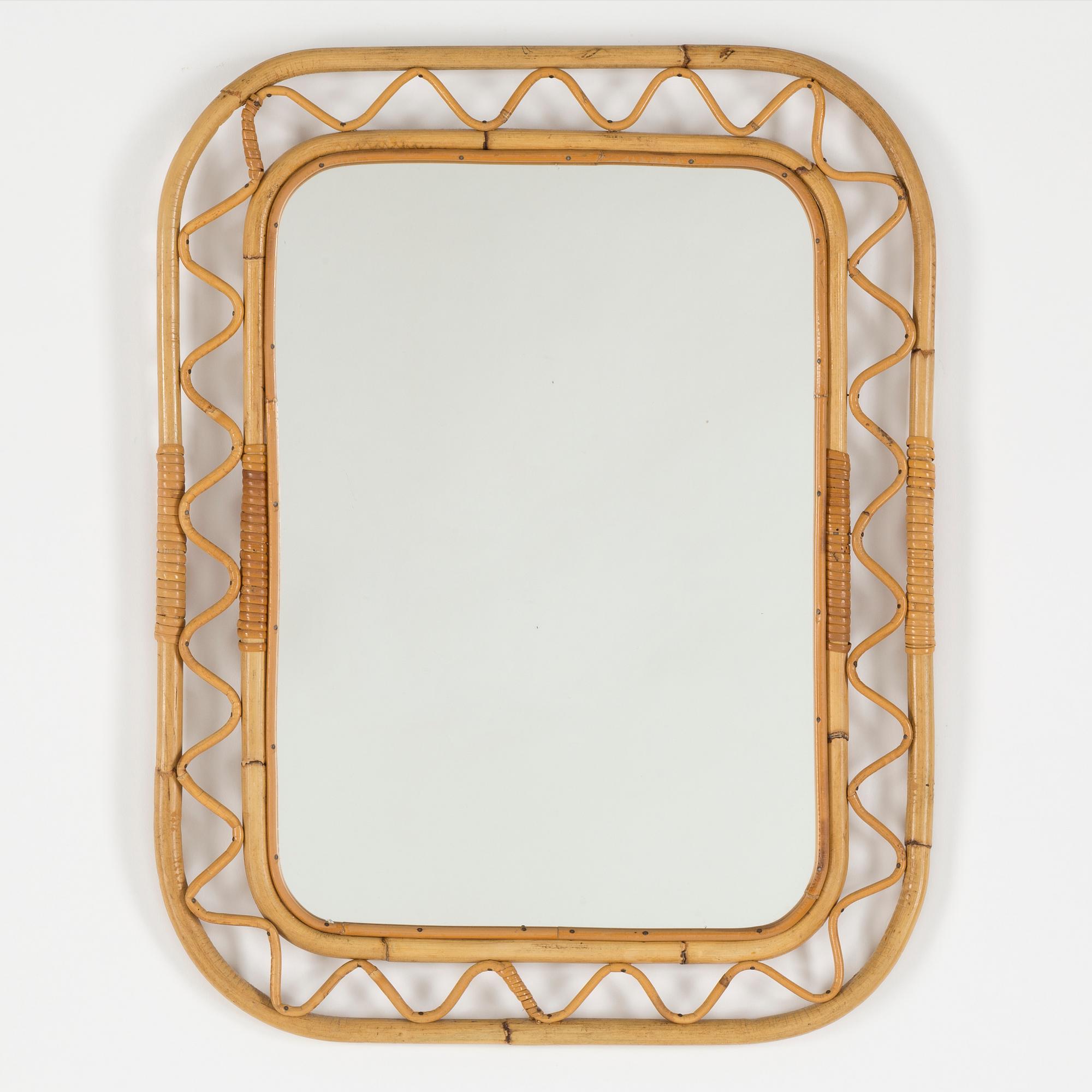A bamboo and rattan mirror, mid 20th Century.