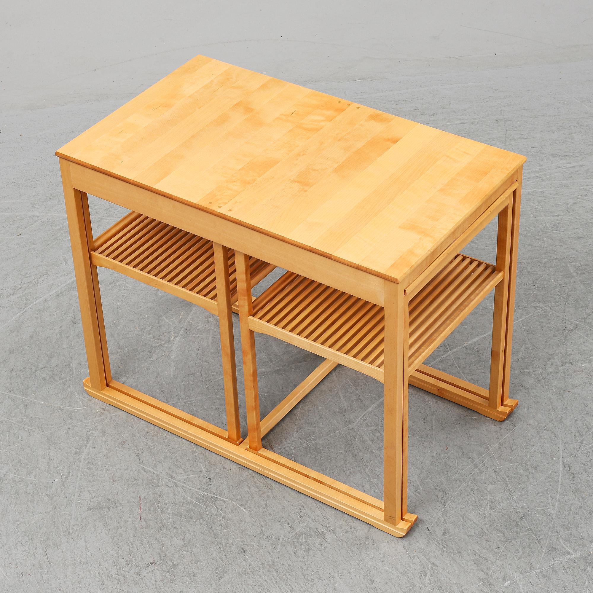 CARL MALMSTEN, a set of three nesting birch tables 'Släden' (The sled), City Möbler AB.