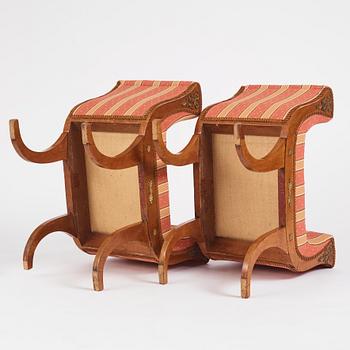 A pair of Swedish Royal Empire stools.