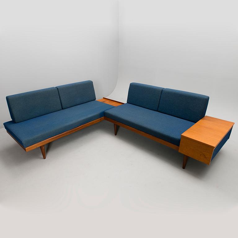 A corner sofa, mid 20th century.