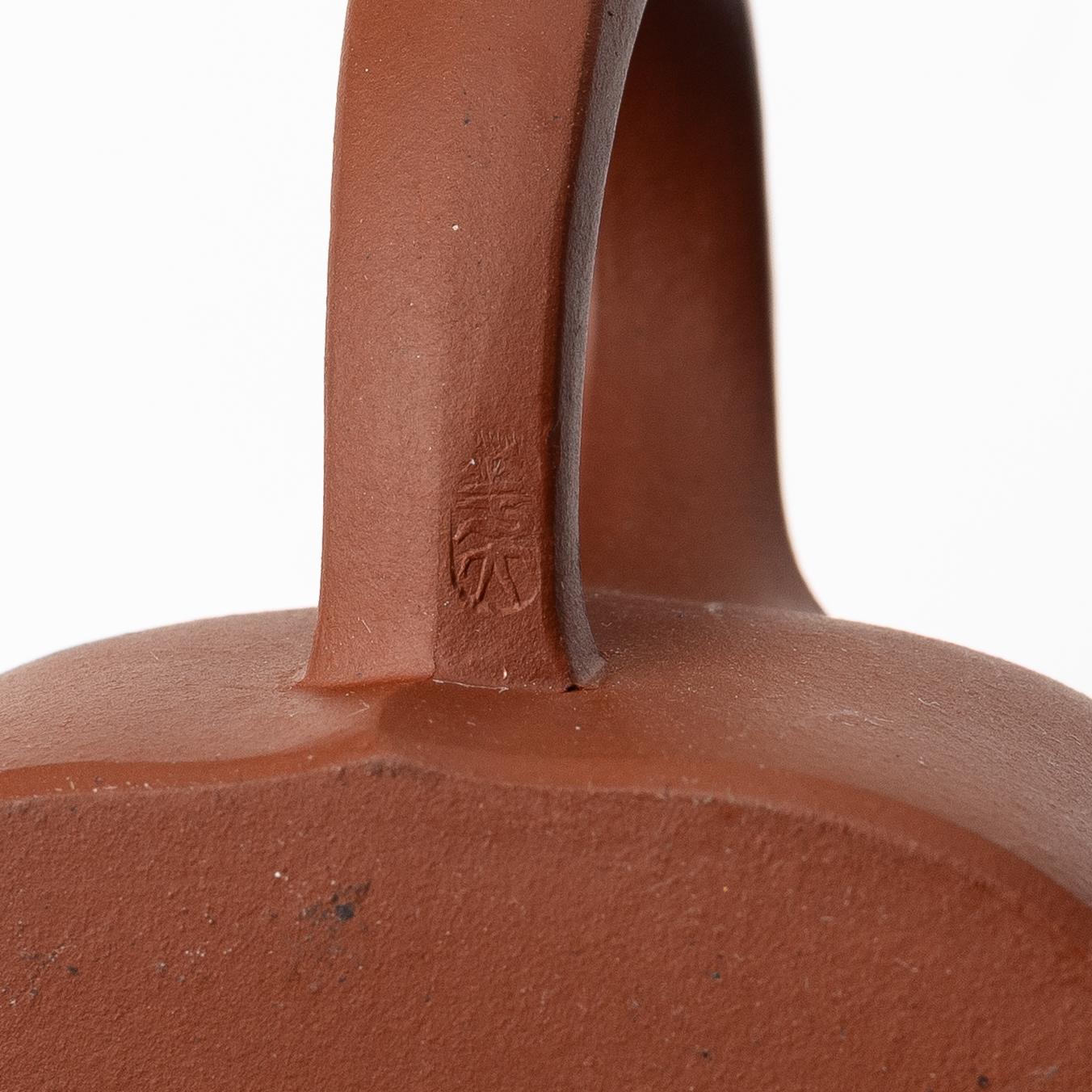 A group of three yixing teapots, China, 1980s.