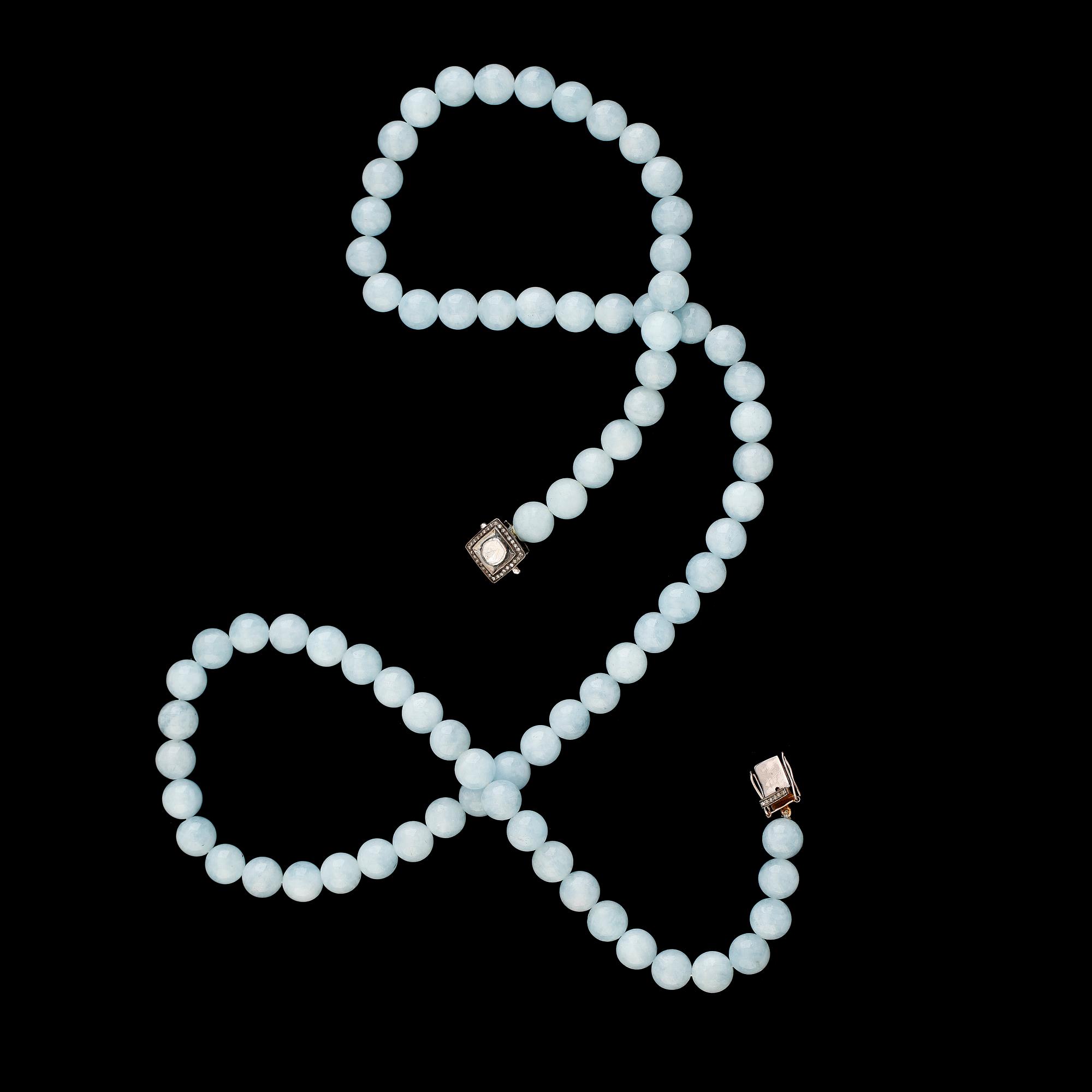 COLLIER, akvamariner, diamanter tot ca 1.30 ct.