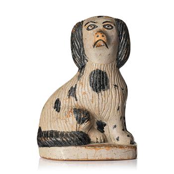 192. A Swedish wooden folk-art sculpture depicting a 'Staffordshire dog' ceramic figurine, 19th century.