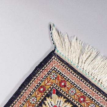 A runner, Ghom, silk. Approx. 100 x 425 cm.