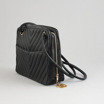 Chanel, a black leather handbag, 1980's.