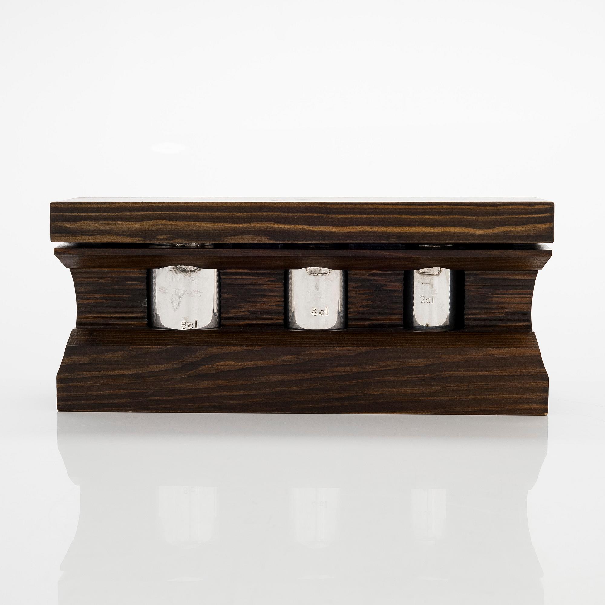 Three spirit measuring cups, silver 830, in a wooden box, Kultakeskus, Finland 1983.