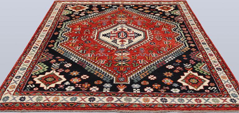 A Shirazi carpet, 237 x 173 cm.