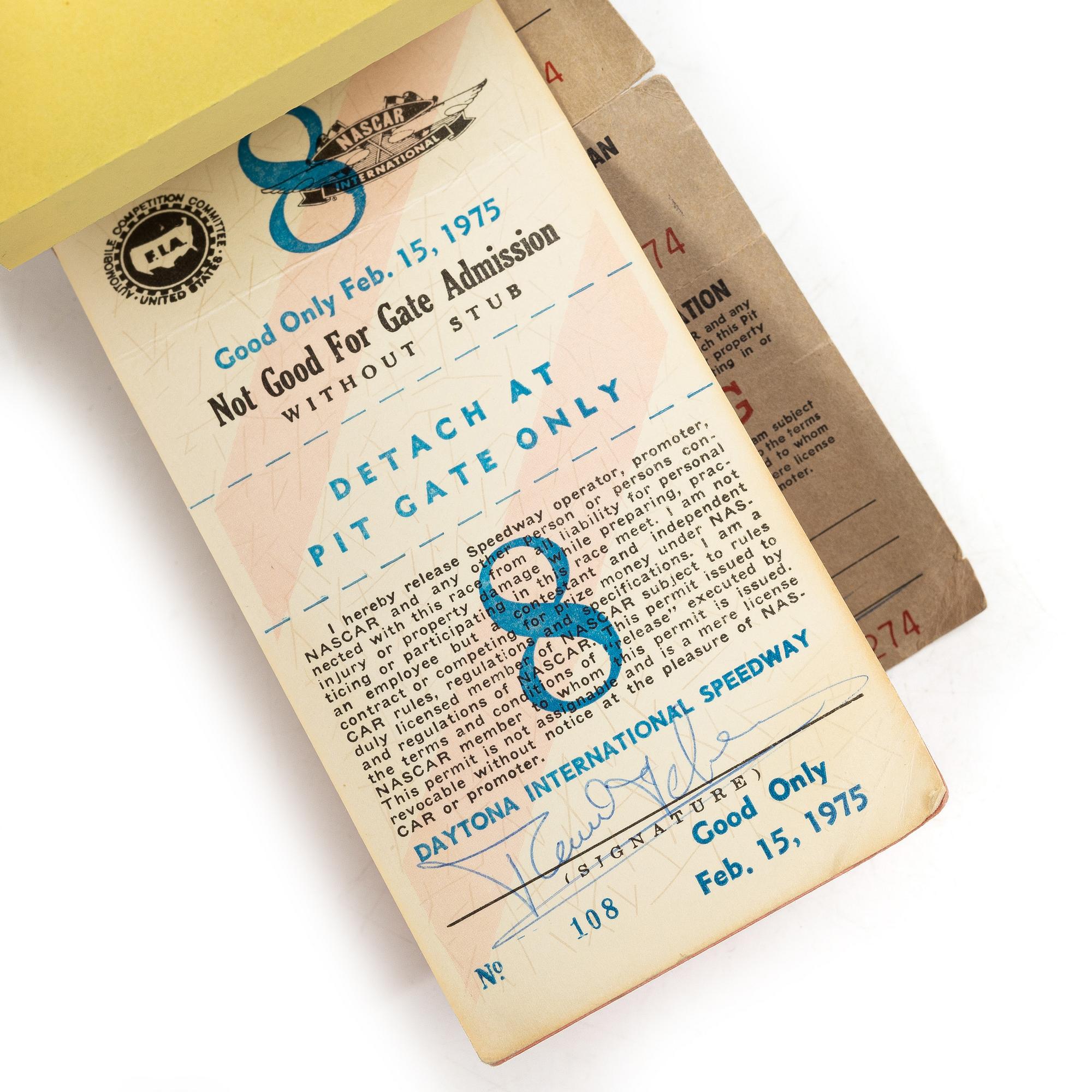 Balaclava/fire hood and access pass for the IROC races at Daytona in February 1975.