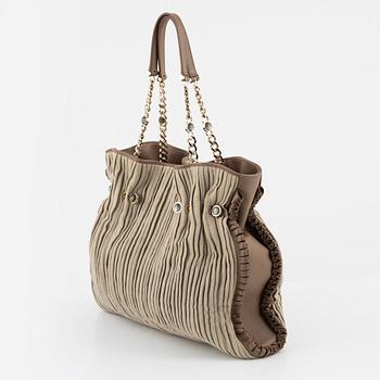 Bulgari, a leather and canvas bag.