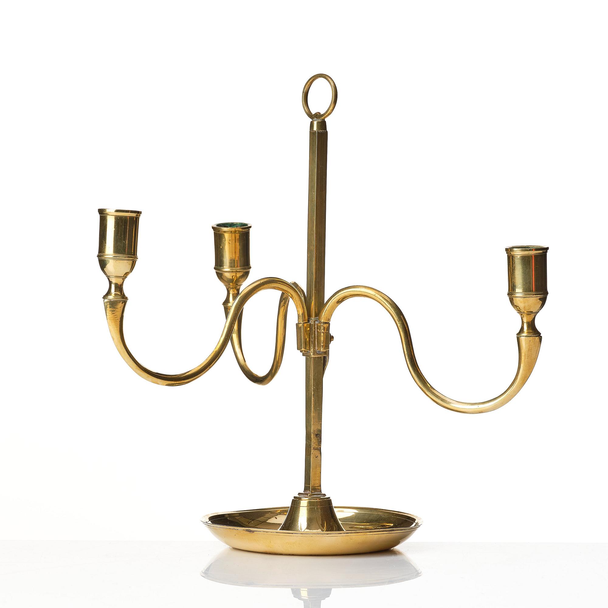 A Gustavian brass three light candelstick.