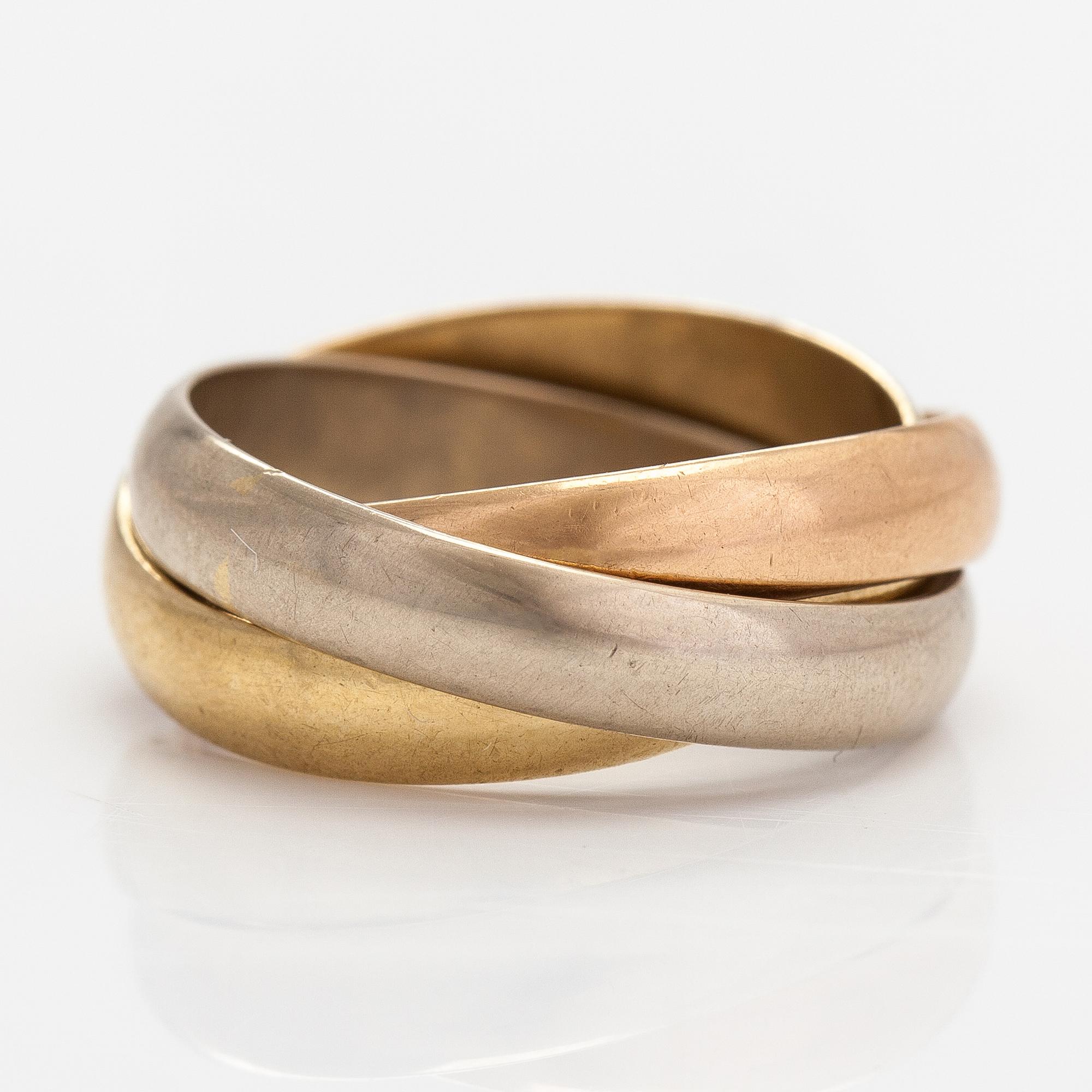 must de Cartier, An 18K gold "Trinity" ring.