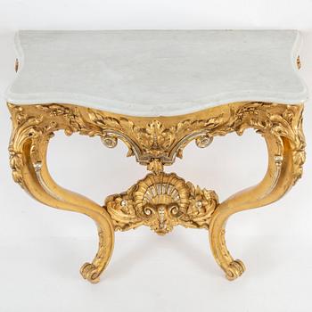 A late 19th century mirror and console table.