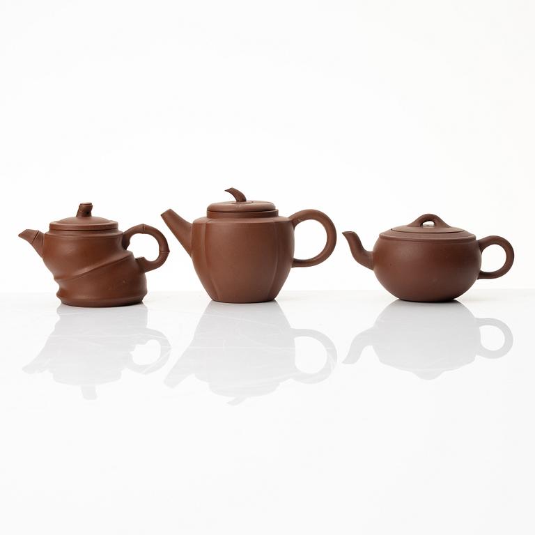 A group of three yixing 'gongfu' teapots, China, 1980s.