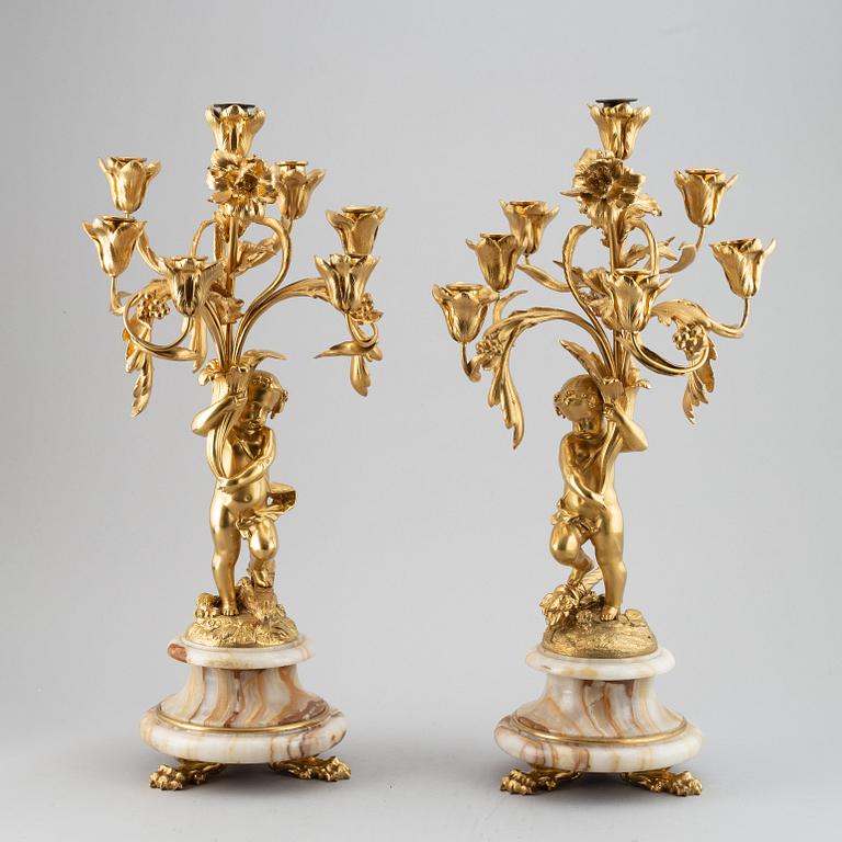A pair of mid 19th century ormolu and onyx candelabra.