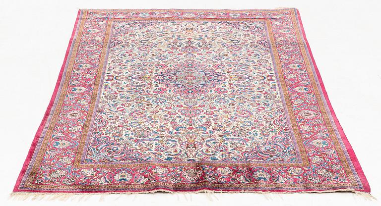 An antique silk Kashan rug, ca ca 200 x 124 cm.