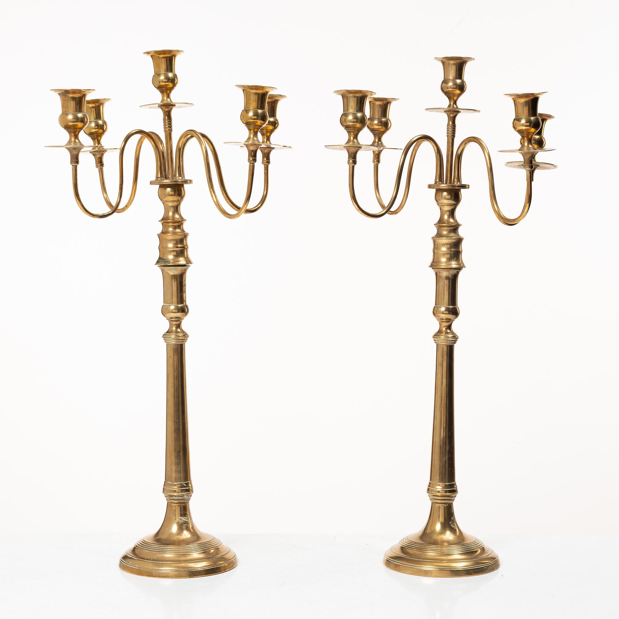 A pair of brass candelabra, model N12, Nyköpings Bruk, Sweden, around 1900.