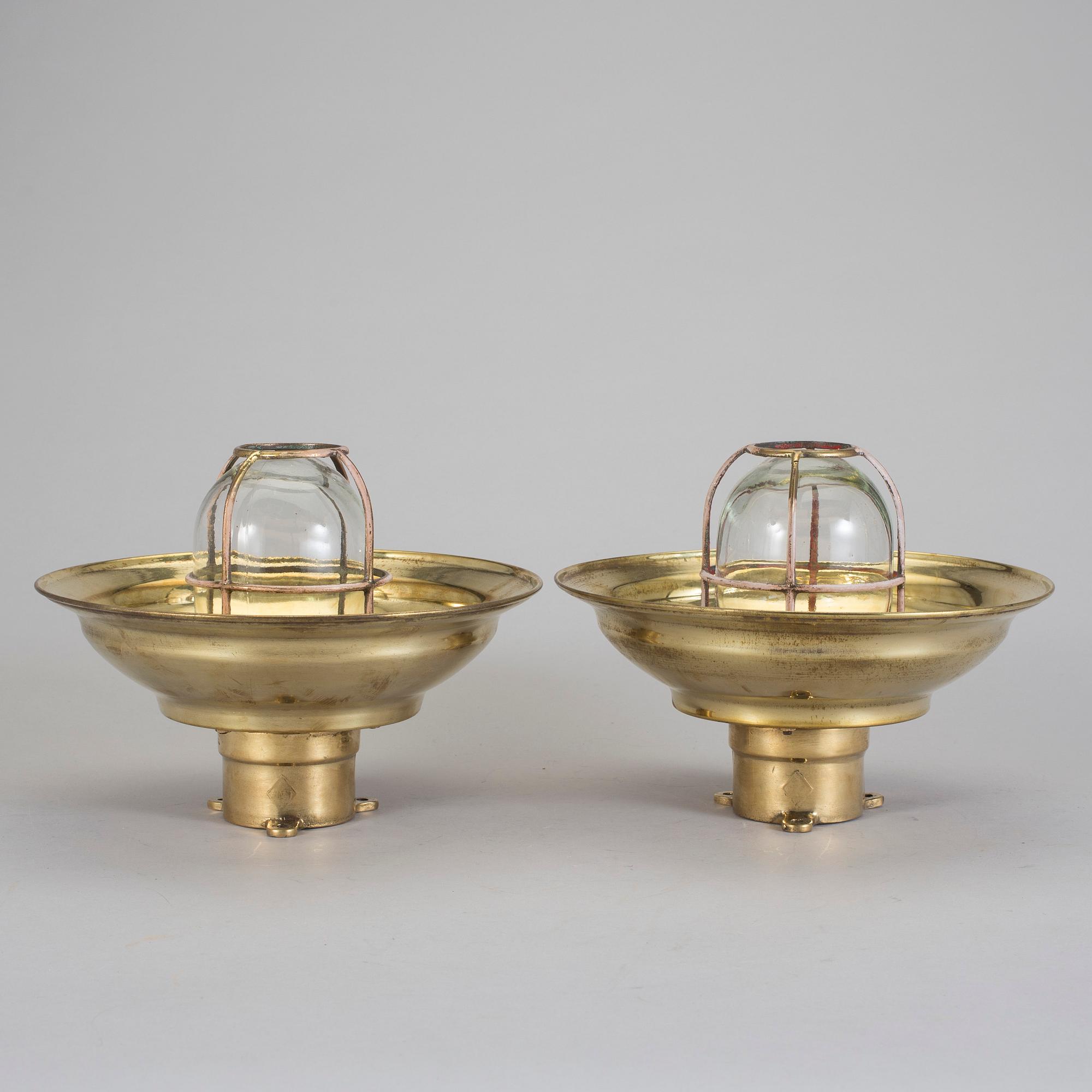 MÄSSBELYSNING, ett par, 1900-tal.