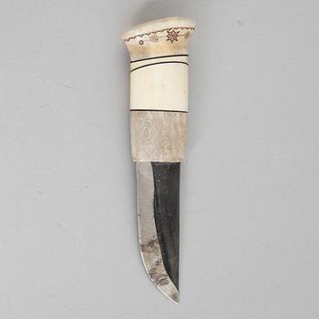 A knife, signed and dated 1992.